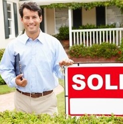 Man with Sold Sign in Hartford, CT